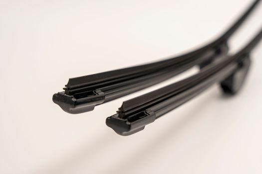 frameless car wiper blades on a white background. Consumable auto parts. High quality photo