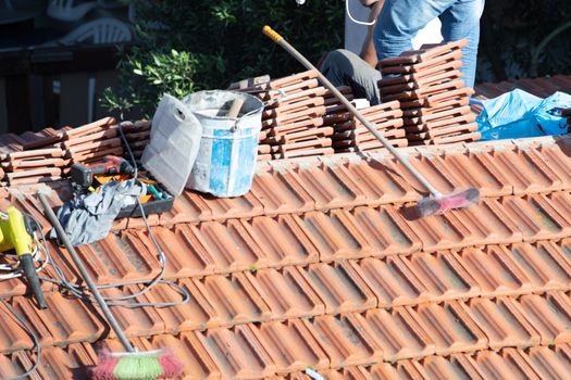 repairing the roof of a home