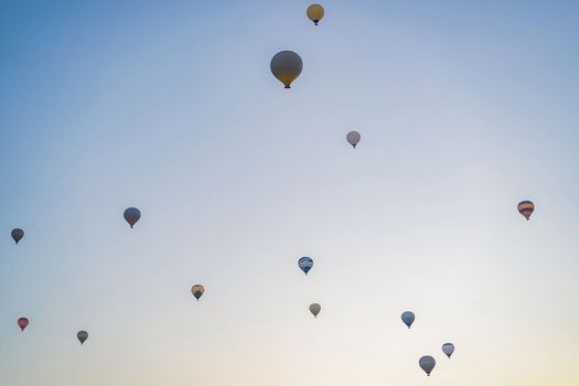 Beautiful hot air balloons over blue sky.