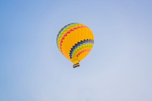 Beautiful hot air balloons over blue sky.