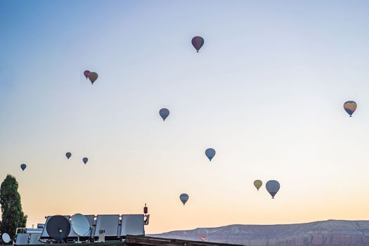 Colorful hot air balloon flying over Cappadocia, Turkey.