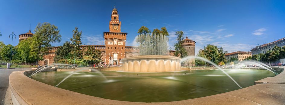 Panoramic view of Castello Sforzesco square with fountain in Milan, Italy. Long Exposure.