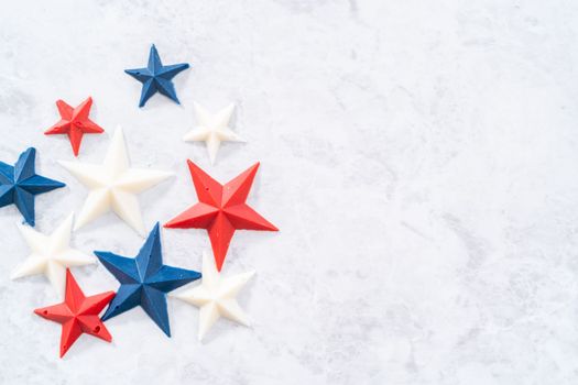 Homemade color chocolate stars that are made from color chocolate molds.