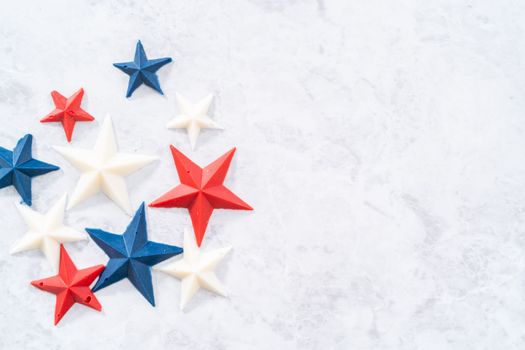 Homemade color chocolate stars that are made from color chocolate molds.