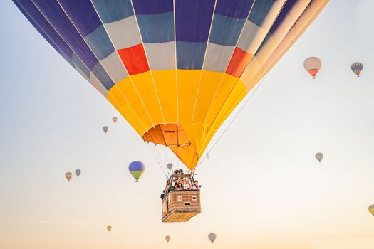 Beautiful hot air balloons over blue sky.