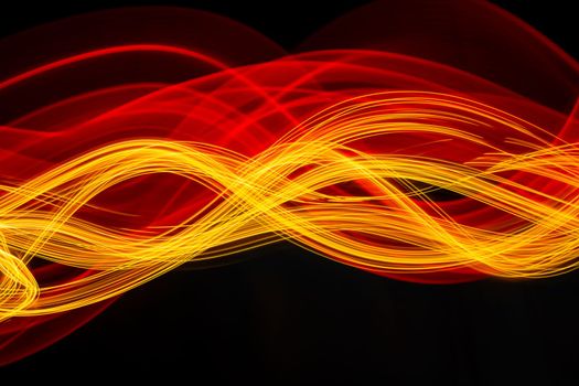 Abstract modern technology banner design. Digital neon fractal lines on black background. Light painting with long exposure. High quality photo