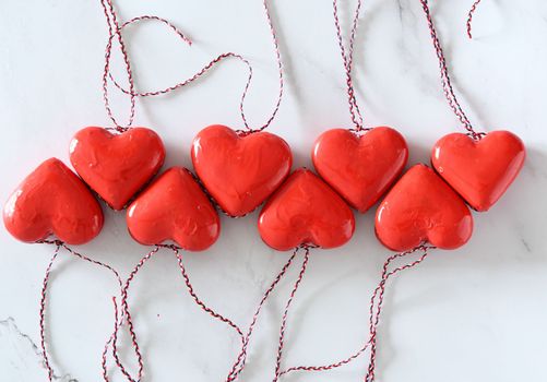 red toy hearts on the white wooden table, gift valentine's day concept, High quality photo