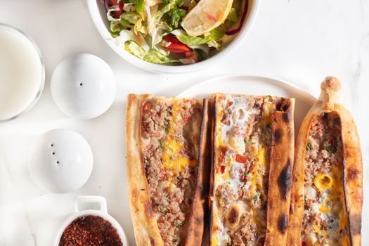 Assorted Turkish foodset. pide with meat , pide with egg, pide mix, lachmajun
