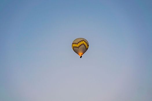 Beautiful hot air balloons over blue sky.