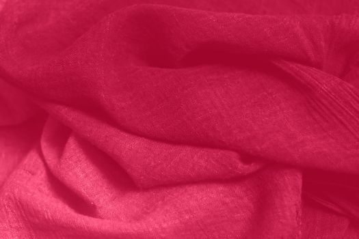 Viva Magenta toned colour monochrome texture fabric. Monochrome dark pink color background. Trendy color 2023.