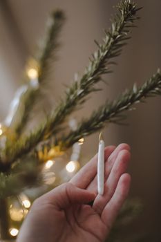 Decorated Christmas tree on blurred, sparkling and fairy background.
