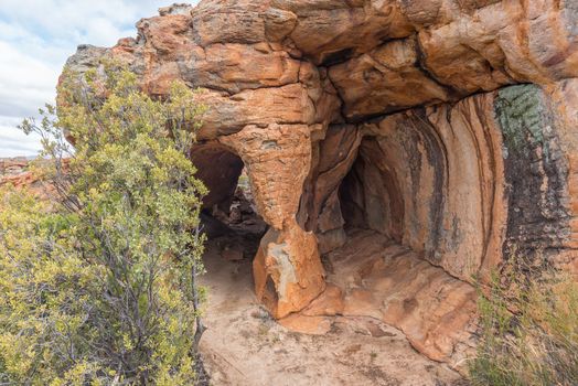 A walking trail passing through a cave at the Stadsaal Caves in the Western Cape Cederberg