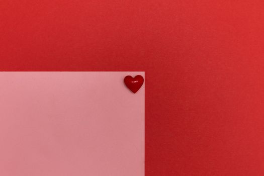 Valentines day red heart on same color background. Monochromatic vivid color. Valentine's day concept. Close up, copy space