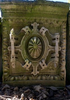 Ancient carved stones in the botanical garden of Coimbra, Portugal