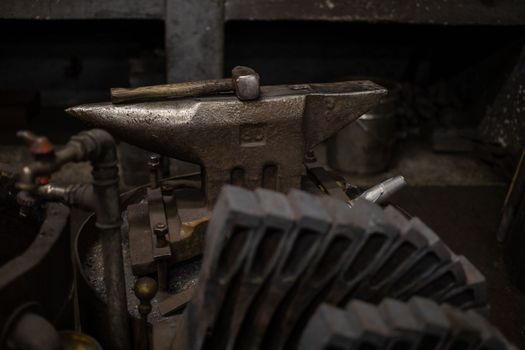 blacksmith tools and metal blanks in privet forge. High quality photo