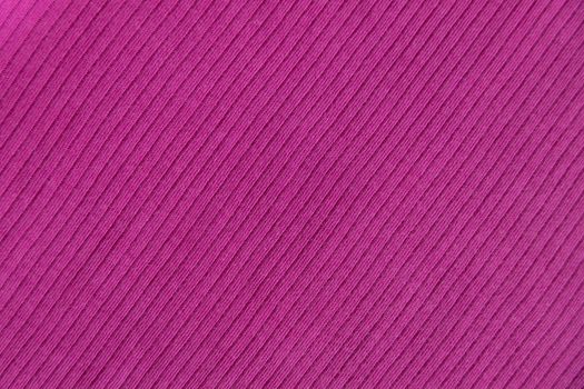 Ribbed cotton fabric texture fuchsia color . Close up rib cotton cloth and textiles pattern. Natural organic fabrics texture background.