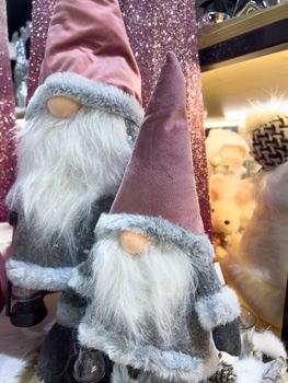three little christmas gnomes gonks in pink hats mobile photo. High quality photo