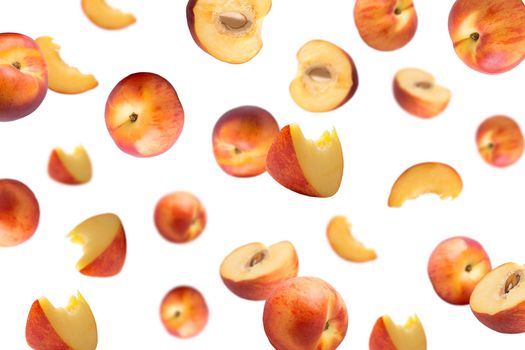 Creative levitation pattern with peach ruits. Selective focus. Isolated fruit. Packaging concept. Clip art image for package design.