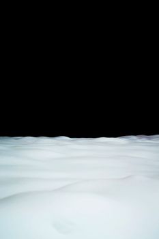 Winter snow background at the bottom and black copyspace at the top. Blank for design