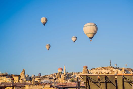 Colorful hot air balloon flying over Cappadocia, Turkey.