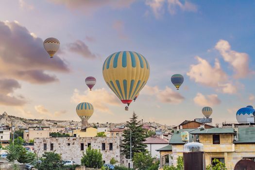 Colorful hot air balloon flying over Cappadocia, Turkey.