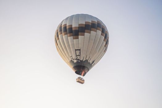 Beautiful hot air balloons over blue sky.