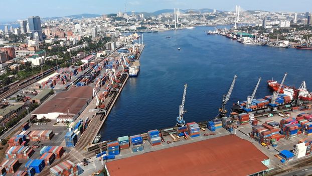 Top view. Vladivostok Commercial Sea Port. Industrial port with containers in Vladivostok