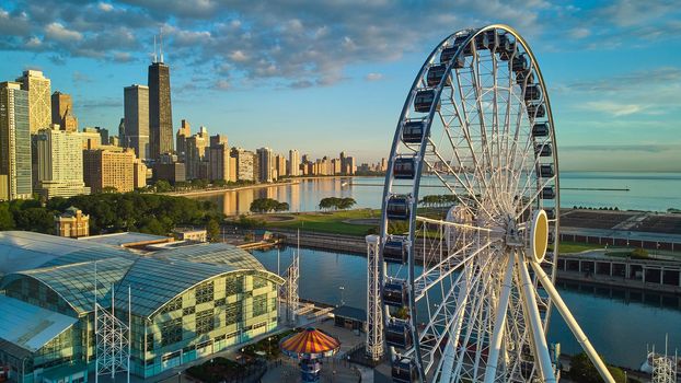Image of Navy Pier in Chicago by ferris wheel with Chicago skyline