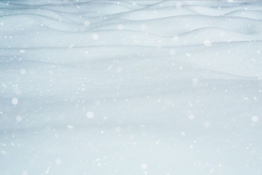Winter landscape. It's snowing outside. Snowflakes are falling and winter snowdrifts are close. Snow is a natural phenomenon. Copyspace