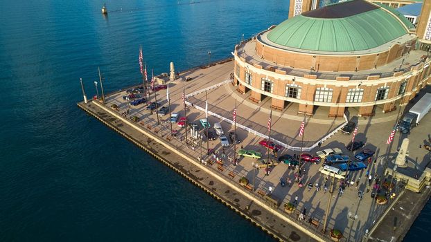 Image of Lake Michigan Navy Pier detail of end with vintage cars on pier