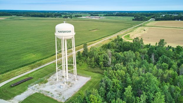 Image of Huntertown, Indiana water tower utility aerial surrounded by corn fields