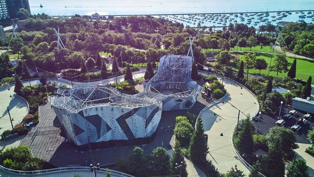 Image of Rock climbing activity center in Millennium Park from above with view of docks and Lake Michigan
