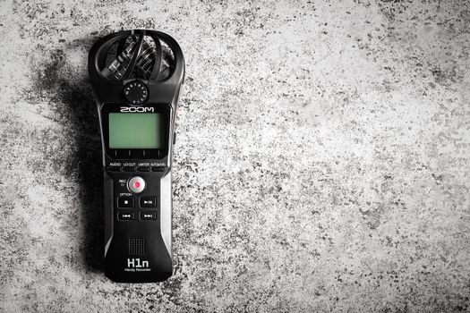 Top view ZOOM H1n Handy recorder with microphone for voice recording, copy space.