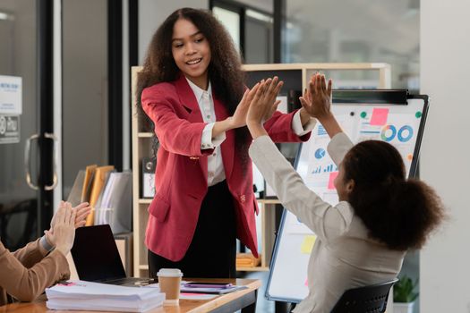 Young African American businesswoman working with partner at office. finance concept.