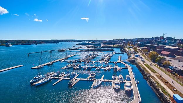 Image of Aerial open view of port filled with boats on Maine coast in Portland