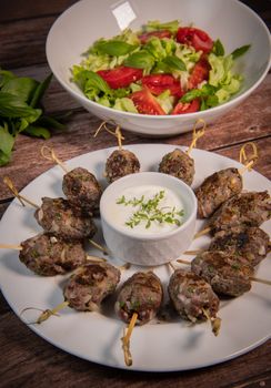 Recipe of kefta, beef skewer, Traditional homemade, with Greek yoghurt sauce, garlic, savory, Arabic and Libanese food, High quality photo