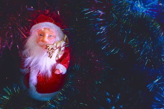 Santa Claus brings happiness and New Years gifts to all of you. Santa Claus and New Year's Christmas toys in magical dusk
