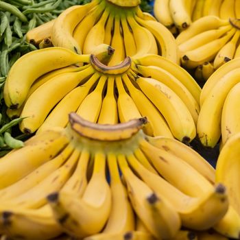 Bunch of ripened bananas at grocery store at a local market