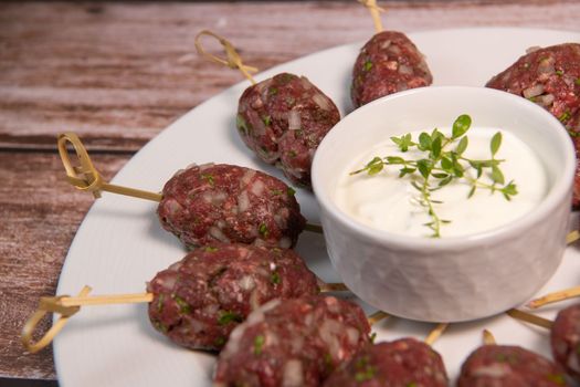Recipe of kefta, beef skewer, Traditional homemade, with Greek yoghurt sauce, garlic, savory, Arabic and Libanese food, High quality photo