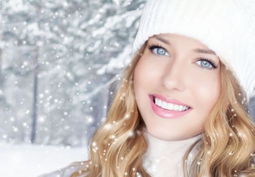 Winter holiday travel, lifestyle and fashion, beautiful happy woman and snowy forest, nature, ski resort and leisure activity outdoors Christmas, New Year and holidays portrait.