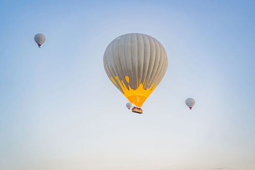 Beautiful hot air balloons over blue sky.