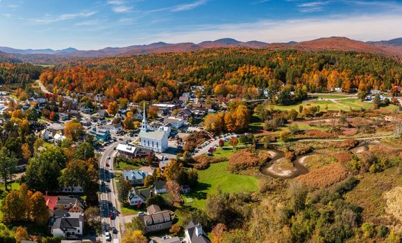Panoramic aerial view of the town of Stowe in Vermont in the fall