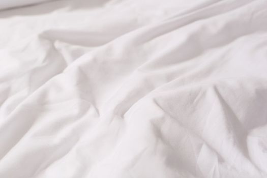 Texture of white cotton crumpled fabric. High quality photo