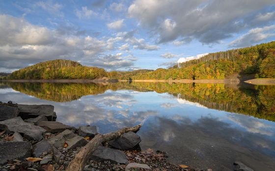 Panoramic image of Agger lake close to Gummersbach in evening light during autumn, Bergisches Land, Germany