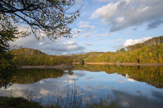 Panoramic image of Agger lake close to Gummersbach in evening light during autumn, Bergisches Land, Germany