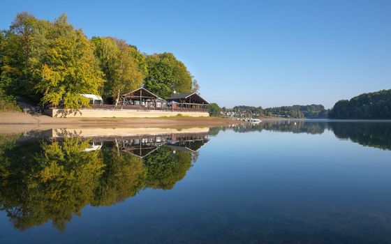 Panoramic image of Bever lake close to Huckeswagen on an early morning during autumn, Bergisches Land, Germany