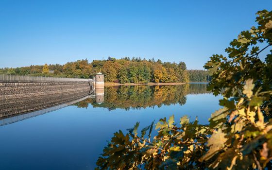 Panoramic image of Neye lake close to Wipperfurth on an early morning during autumn, Bergisches Land, Germany