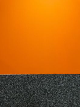 Seamless texture of orange grey cement wall a rough surface, with space for text, for a background. High quality photo