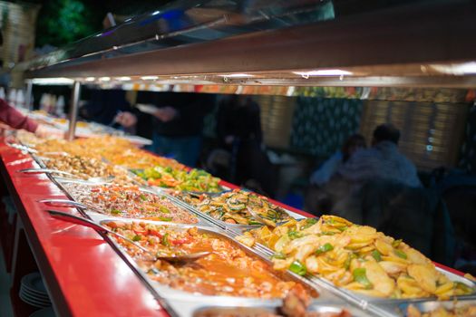 Traditional Asian food in a buffet restaurant in europe.