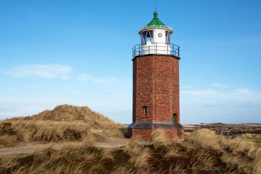 Panoramic image of Kampen lighthouse against blue sky, Sylt, North Frisia, Germany 